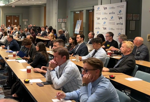 A group of loyalty professionals listening to an interesting talk about the future of digital platforms and new partnerships.