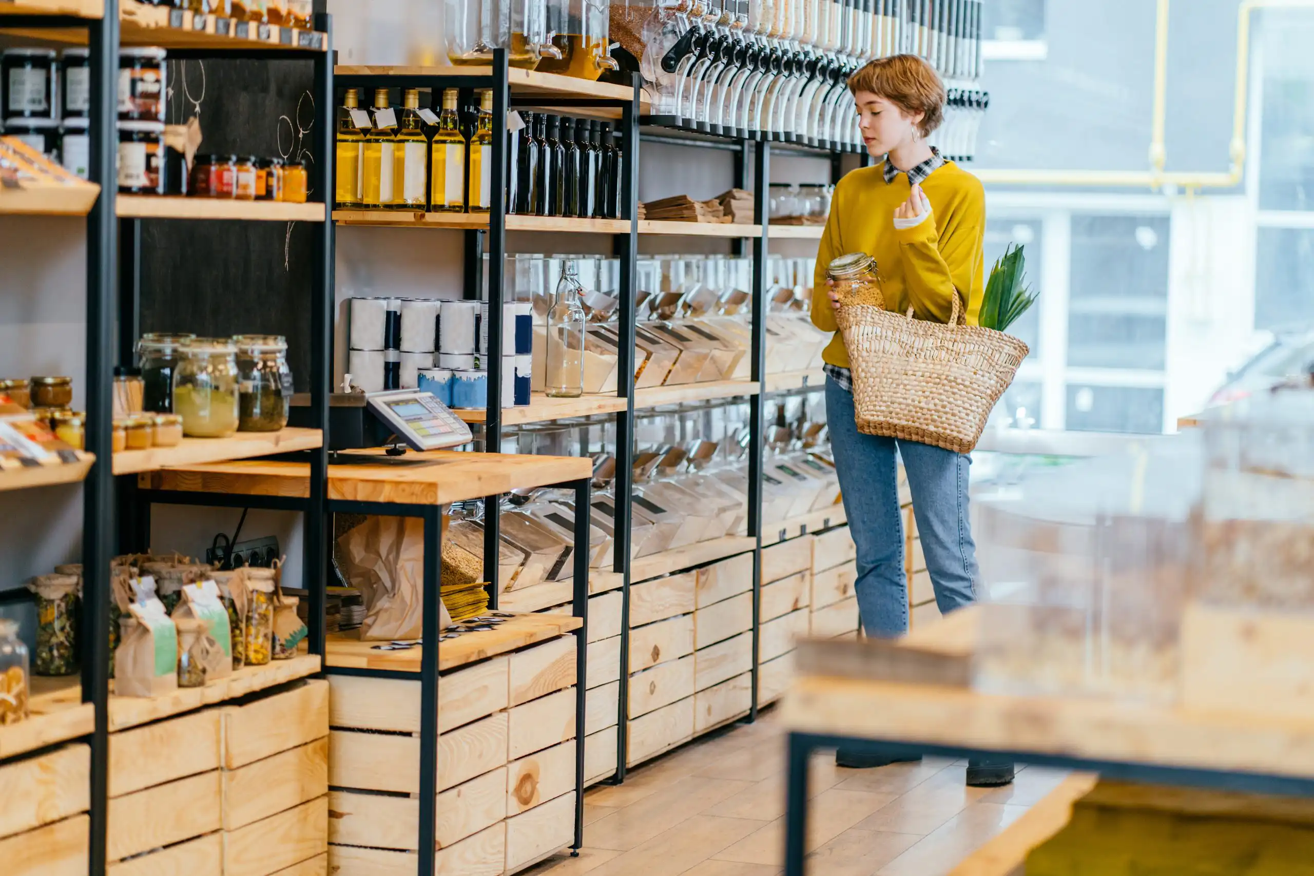 woman shopping in a gourmet food store